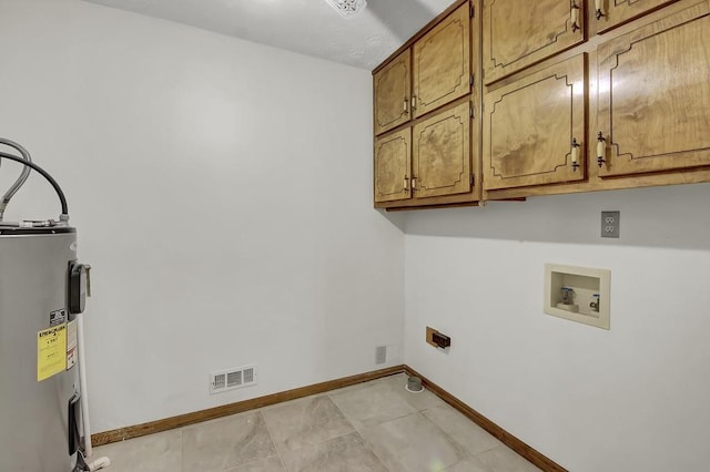 washroom featuring cabinets, washer hookup, and electric water heater