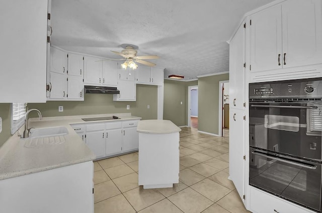 kitchen with sink, black appliances, white cabinets, and ceiling fan