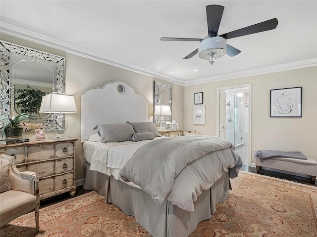 bedroom featuring ceiling fan, crown molding, and ensuite bathroom