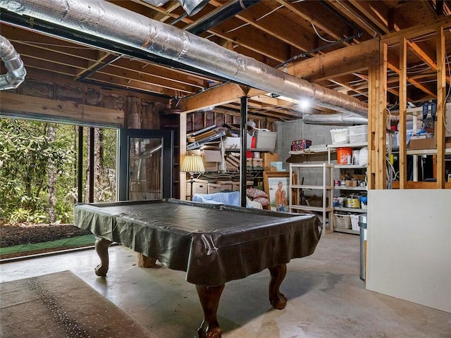 playroom with concrete floors and pool table