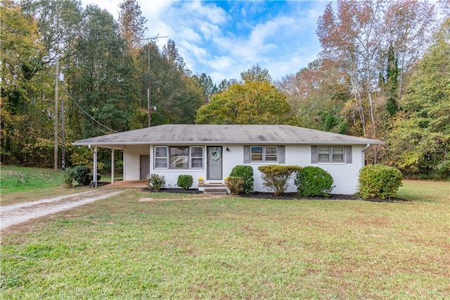 ranch-style house with a front lawn