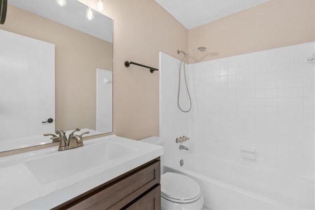 full bathroom with vanity,  shower combination, and toilet