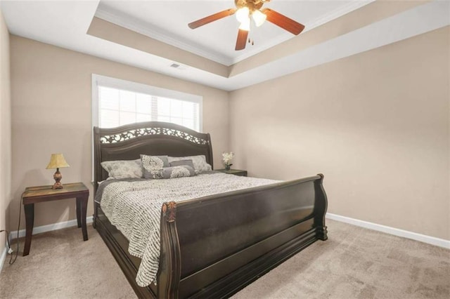 229 Primstone Way, Mcdonough, GA 30253 - bedroom featuring crown molding, baseboards, a tray ceiling, carpet floors, and a ceiling fan