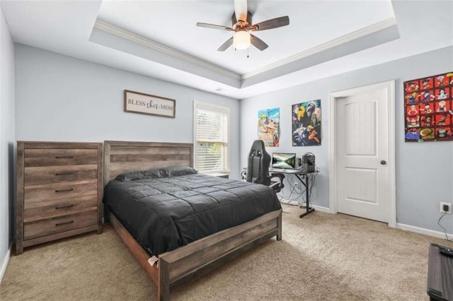 229 Primstone Way, Mcdonough, GA 30253 - carpeted bedroom with crown molding, a tray ceiling, baseboards, and a ceiling fan