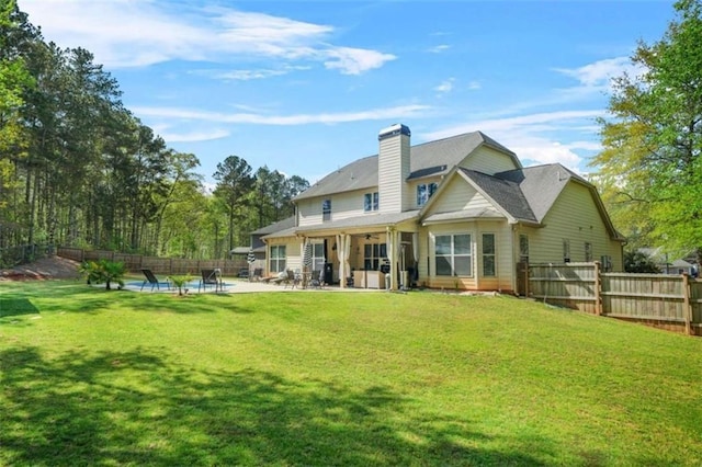 229 Primstone Way, Mcdonough, GA 30253 - back of house with a patio area, a ceiling fan, and a chimney