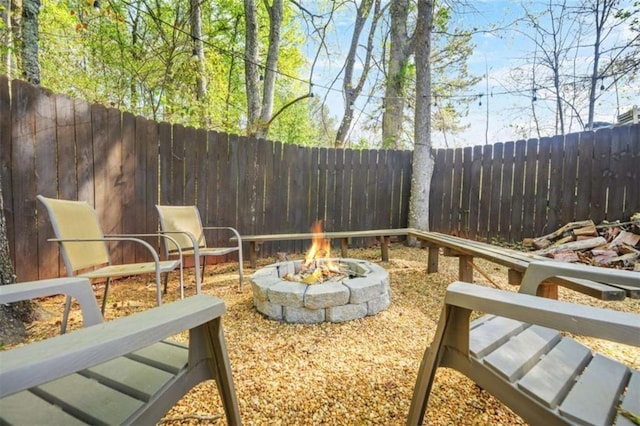 229 Primstone Way, Mcdonough, GA 30253 - view of patio / terrace with a fire pit