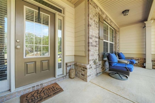 229 Primstone Way, Mcdonough, GA 30253 - property entrance featuring a porch and brick siding