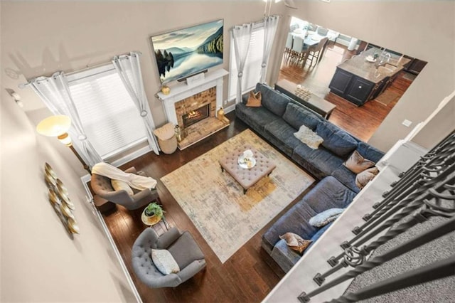 229 Primstone Way, Mcdonough, GA 30253 - living area featuring wood finished floors and a tile fireplace
