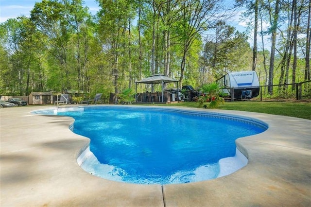 229 Primstone Way, Mcdonough, GA 30253 - outdoor pool with a gazebo and a patio area