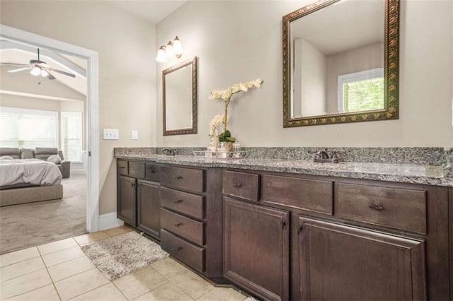 229 Primstone Way, Mcdonough, GA 30253 - ensuite bathroom featuring double vanity, ceiling fan, baseboards, and tile patterned floors