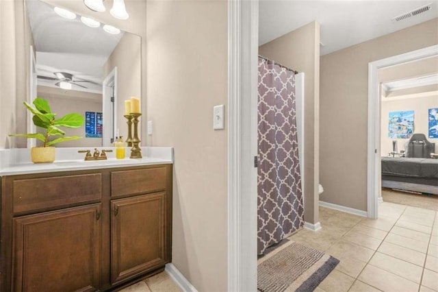 229 Primstone Way, Mcdonough, GA 30253 - full bathroom featuring vanity, ensuite bath, tile patterned floors, ceiling fan, and toilet