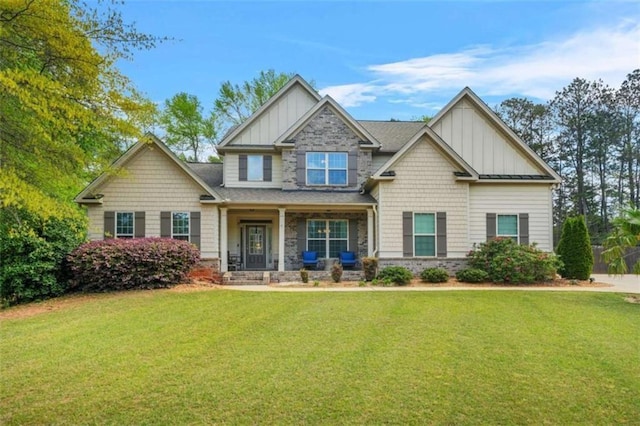 229 Primstone Way, Mcdonough, GA 30253 - craftsman-style house featuring board and batten siding, a porch, and a front yard