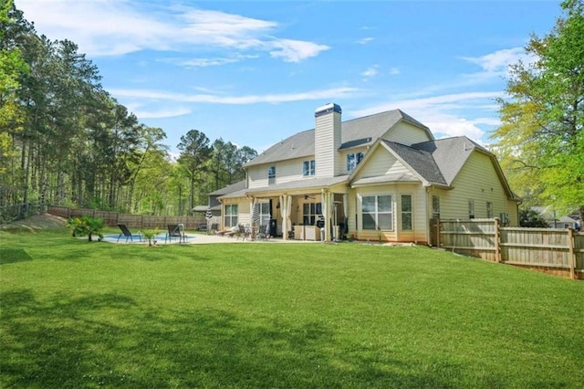 229 Primstone Way, Mcdonough, GA 30253 - rear view of property featuring a ceiling fan, a patio area, and a chimney