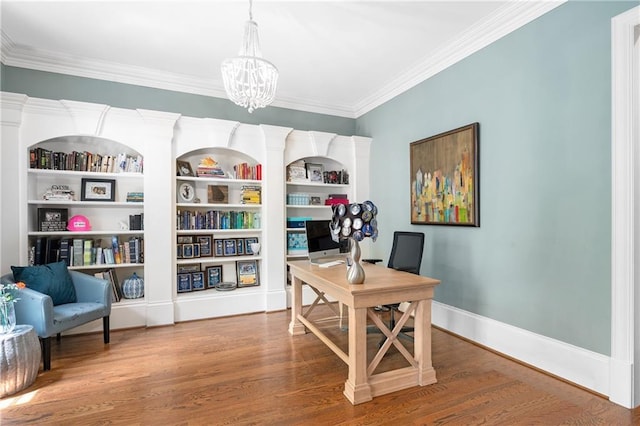 8643 Ellard Dr, Alpharetta, GA 30022 - office with crown molding, wood finished floors, a chandelier, and built in shelves