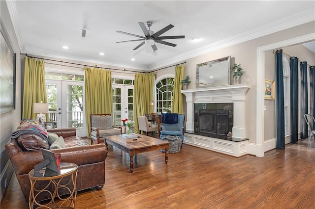 8643 Ellard Dr, Alpharetta, GA 30022 - living room with french doors, crown molding, ceiling fan, wood finished floors, and a high end fireplace