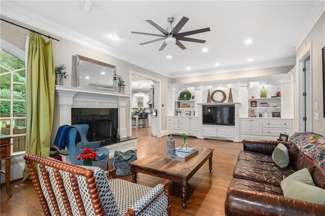 8643 Ellard Dr, Alpharetta, GA 30022 - living room with ceiling fan, crown molding, wood finished floors, a tile fireplace, and recessed lighting