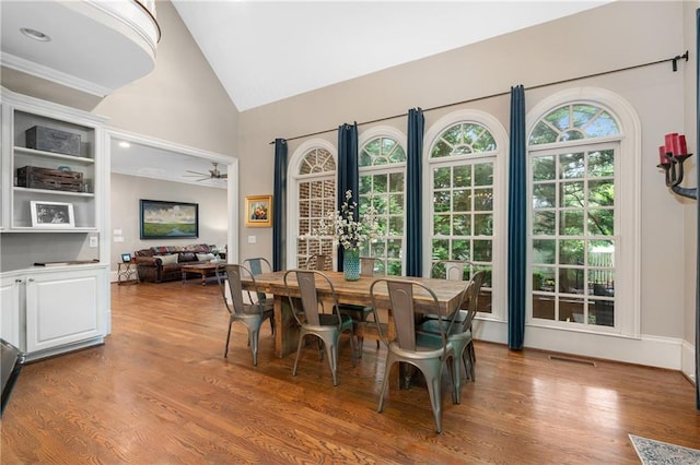 8643 Ellard Dr, Alpharetta, GA 30022 - dining space featuring high vaulted ceiling, wood finished floors, and a ceiling fan