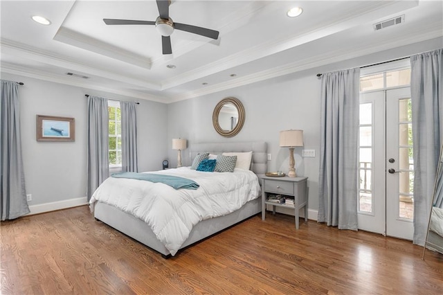 8643 Ellard Dr, Alpharetta, GA 30022 - bedroom featuring a raised ceiling, ornamental molding, wood finished floors, access to exterior, and french doors