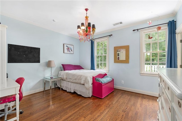 8643 Ellard Dr, Alpharetta, GA 30022 - bedroom featuring ornamental molding, wood finished floors, and a chandelier