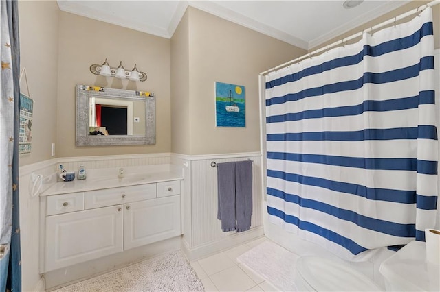 8643 Ellard Dr, Alpharetta, GA 30022 - bathroom featuring vanity, crown molding, wainscoting, tile patterned floors, and a shower with shower curtain