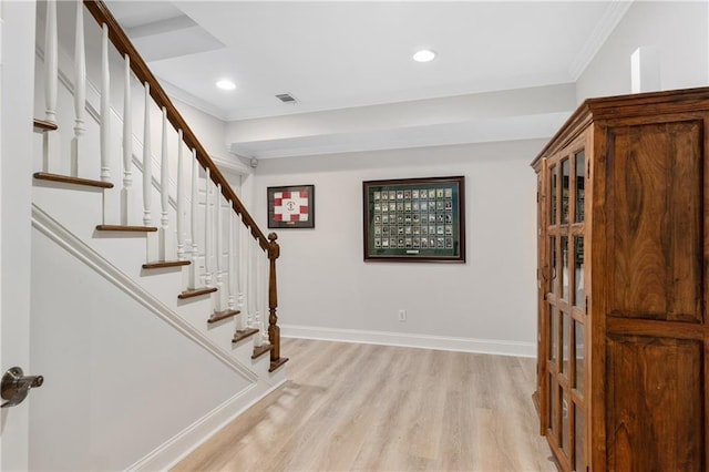 8643 Ellard Dr, Alpharetta, GA 30022 - stairway with crown molding, wood finished floors, and recessed lighting