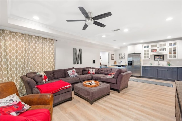 8643 Ellard Dr, Alpharetta, GA 30022 - living area with light wood-type flooring, ceiling fan, recessed lighting, crown molding, and bar area