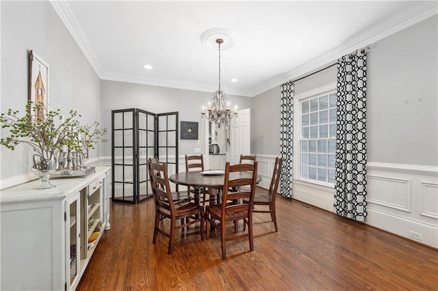 8643 Ellard Dr, Alpharetta, GA 30022 - dining room with a chandelier, dark wood-style flooring, ornamental molding, and recessed lighting