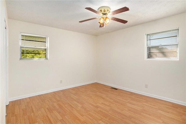 40 Kingston Dr, Comer, GA 30629 - empty room featuring light wood-type flooring, baseboards, and ceiling fan