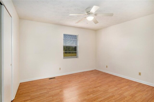 40 Kingston Dr, Comer, GA 30629 - spare room featuring baseboards, a ceiling fan, visible vents, and light wood-style flooring