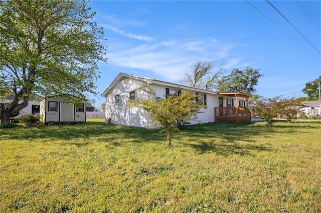 40 Kingston Dr, Comer, GA 30629 - exterior space featuring a lawn, an outdoor structure, a wooden deck, and a shed