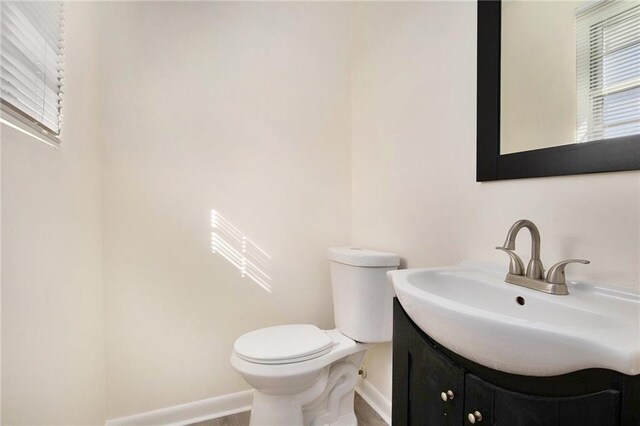 40 Kingston Dr, Comer, GA 30629 - bathroom with baseboards, vanity, and toilet