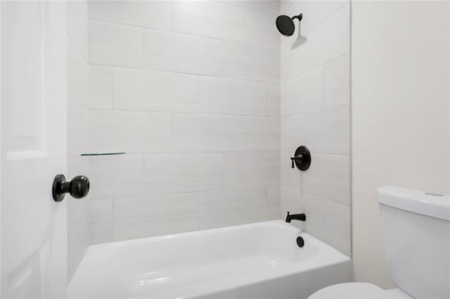 full bath featuring toilet and shower / washtub combination