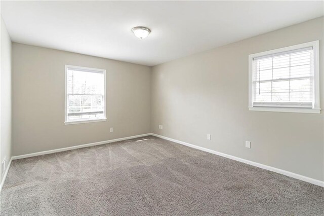 view of carpeted spare room