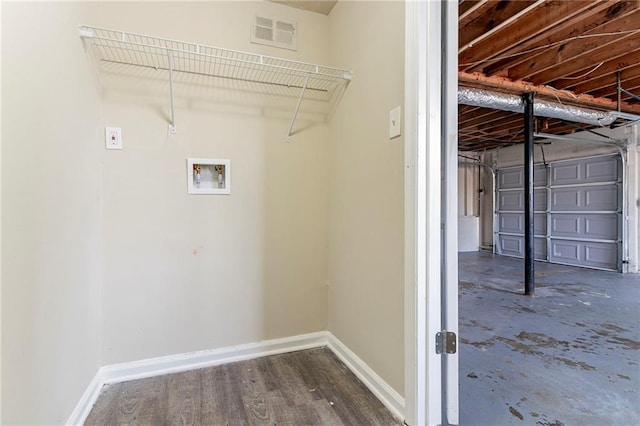 laundry room with washer hookup and dark wood-type flooring