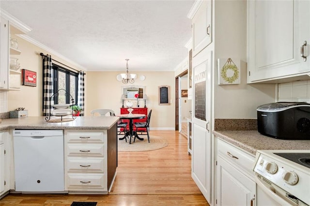 kitchen featuring pendant lighting, electric range oven, white cabinetry, light wood-type flooring, and dishwasher