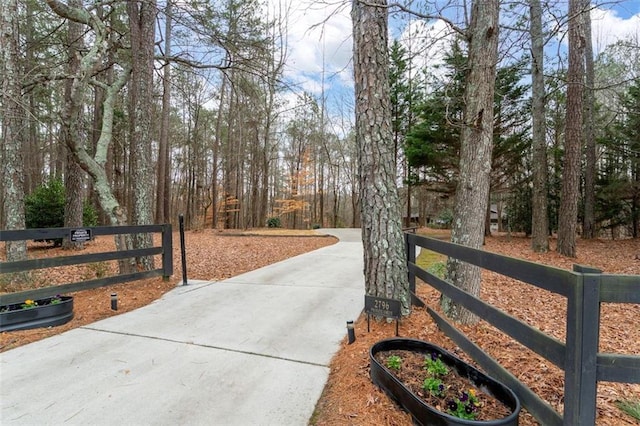 exterior space featuring concrete driveway