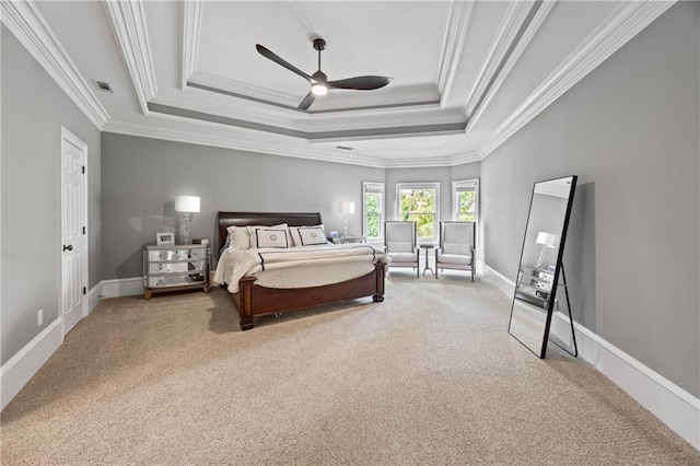 2517 Stone Manor Dr, Buford, GA 30519 - carpeted bedroom with a tray ceiling, crown molding, ceiling fan, and baseboards