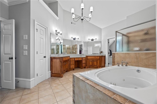 2517 Stone Manor Dr, Buford, GA 30519 - bathroom featuring a jetted tub, vanity, a chandelier, tile patterned flooring, and a stall shower