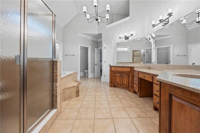2517 Stone Manor Dr, Buford, GA 30519 - full bath with a stall shower, double vanity, a bath, a chandelier, and tile patterned flooring