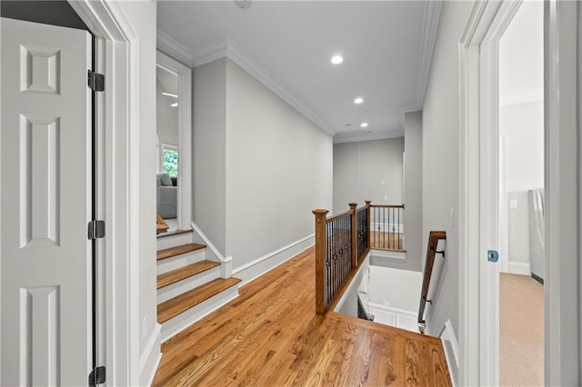 2517 Stone Manor Dr, Buford, GA 30519 - corridor featuring an upstairs landing, crown molding, recessed lighting, baseboards, and light wood-type flooring