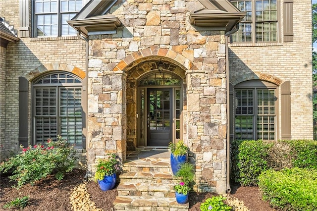 2517 Stone Manor Dr, Buford, GA 30519 - property entrance featuring stone siding and brick siding
