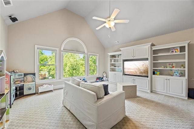 2517 Stone Manor Dr, Buford, GA 30519 - living room with high vaulted ceiling, a ceiling fan, and light colored carpet