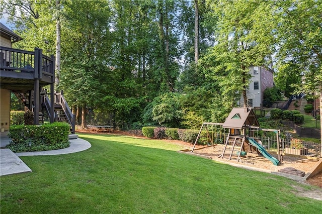 2517 Stone Manor Dr, Buford, GA 30519 - view of yard with stairway, a trampoline, a deck, and view of scattered trees