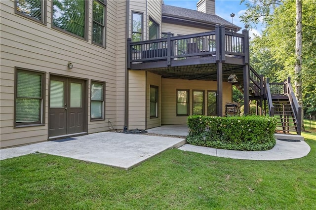 2517 Stone Manor Dr, Buford, GA 30519 - back of house with stairs, a patio area, a deck, a lawn, and a chimney