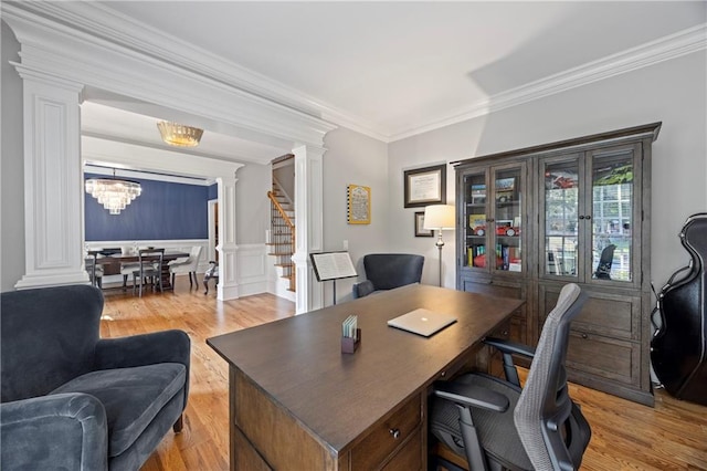 2517 Stone Manor Dr, Buford, GA 30519 - office space with ornate columns, ornamental molding, light wood-style flooring, a chandelier, and a wainscoted wall