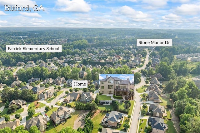 2517 Stone Manor Dr, Buford, GA 30519 - aerial view of residential area with a heavily wooded area