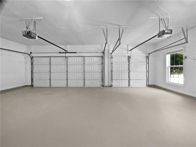 63 Couch Rd, Senoia, GA 30276 - garage featuring a garage door opener