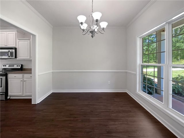 63 Couch Rd, Senoia, GA 30276 - unfurnished dining area with a chandelier, ornamental molding, dark wood-type flooring, and baseboards