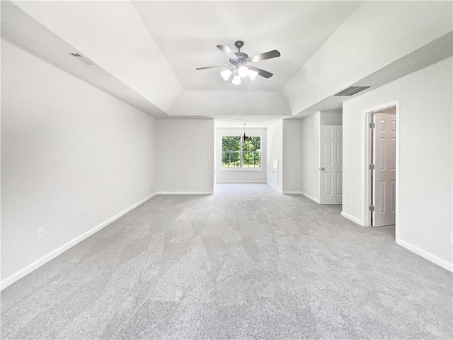 63 Couch Rd, Senoia, GA 30276 - carpeted spare room featuring a raised ceiling, ceiling fan, and baseboards