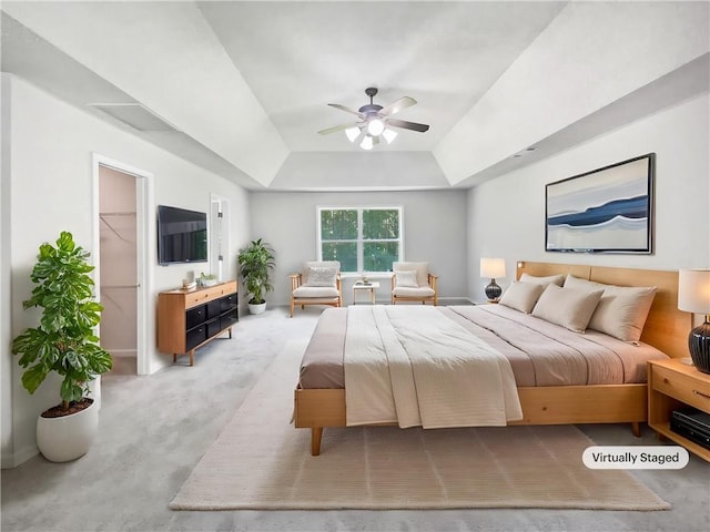 63 Couch Rd, Senoia, GA 30276 - bedroom featuring a tray ceiling, carpet flooring, and a ceiling fan